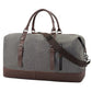 Sac de voyage gris avec poches extérieures visibles