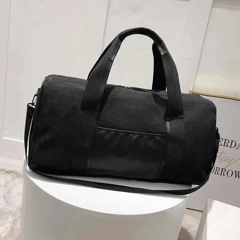Sac noir élégant avec détails en cuir et fermeture éclair