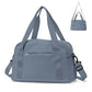 Sac bleu avec sangle arrière pour fixation sur valise