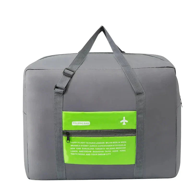 Sac de voyage noir, dimensions cabine, posé sur une valise