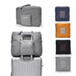Sac de voyage pliant gris, format cabine, sur fond blanc