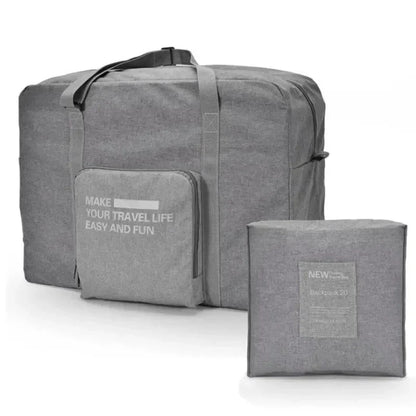 Sac pliant gris, compact et léger, idéal pour cabine
