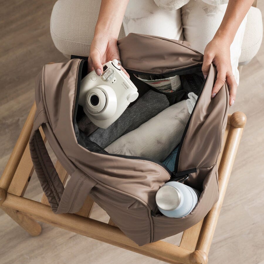 Compartiment séparé pour chaussures dans le sac