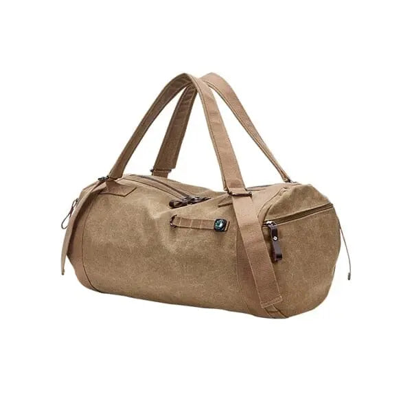 Sac vintage camel posé sur un fond neutre