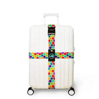 Gros plan sur sangle valise avec motif coloré et étiquette