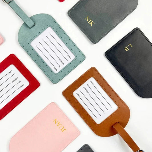 Tag turquoise pour bagage avec détails dorés raffinés