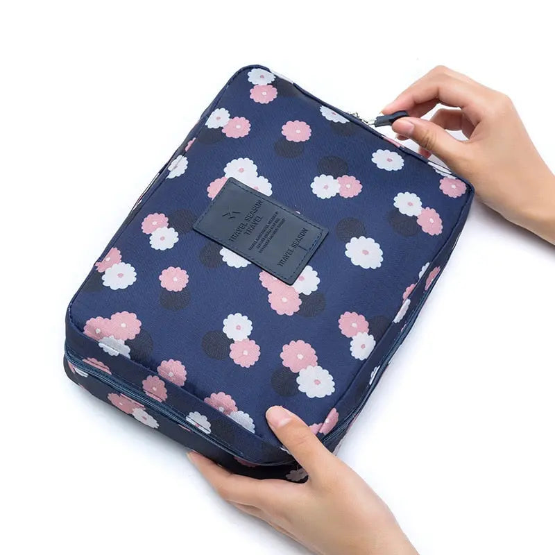 Trousse de maquillage à fleurs avec zip, vue de face
