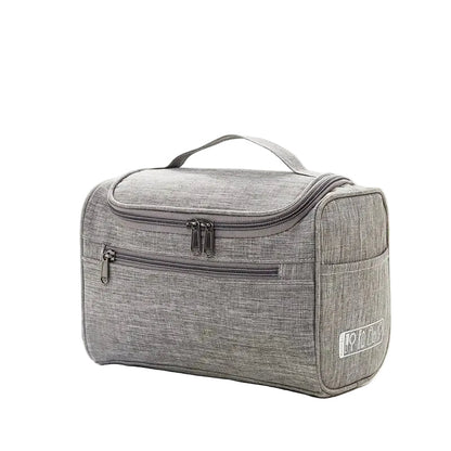 Trousse grise avec détails en polyester, vue de côté