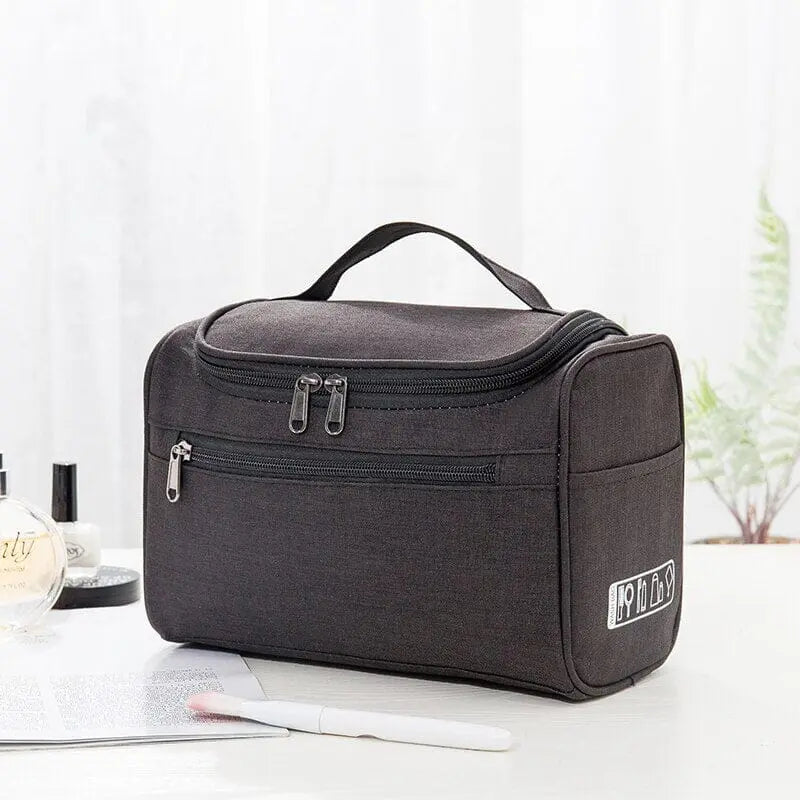 Trousse noire élégante avec fermeture éclair visible