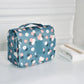 Trousse de toilette fermée avec poignée de transport