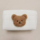 Trousse beige et marron pour bébé avec motif ourson
