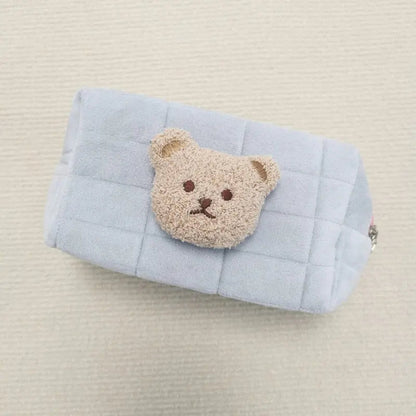Trousse bleue pour enfant avec motif ourson brodé