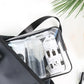 Trousse de toilette transparente montrant des flacons de voyage