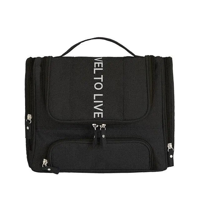 Vue de face d'une trousse de toilette noire avec fermeture éclair