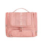 Trousse de toilette rose avec poignée et plusieurs sections