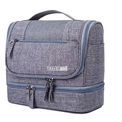 Trousse de toilette grise avec crochet et compartiments visibles