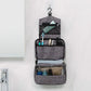 Trousse de toilette grise suspendue avec crochet visible