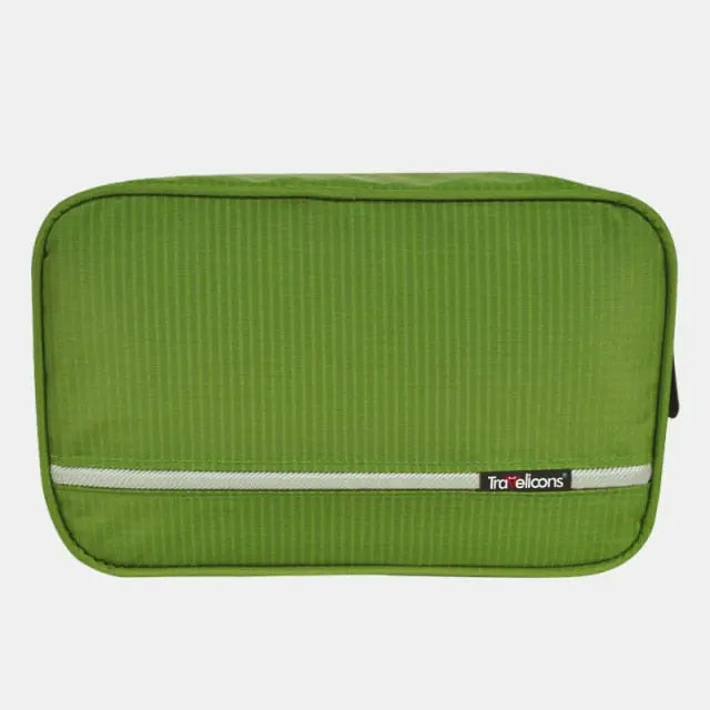 Trousse de toilette kaki, vue latérale montrant les poches