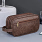 Trousse de toilette marron foncé avec finitions soignées