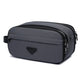 Trousse de toilette ouverte montrant son grand compartiment principal