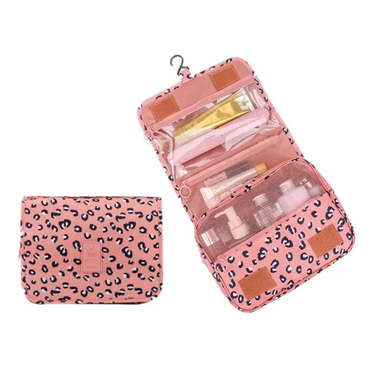 Trousse pliée léopard rose avec poignée et fermeture éclair