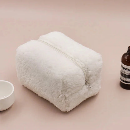 Trousse blanche en flanelle avec fermeture éclair visible