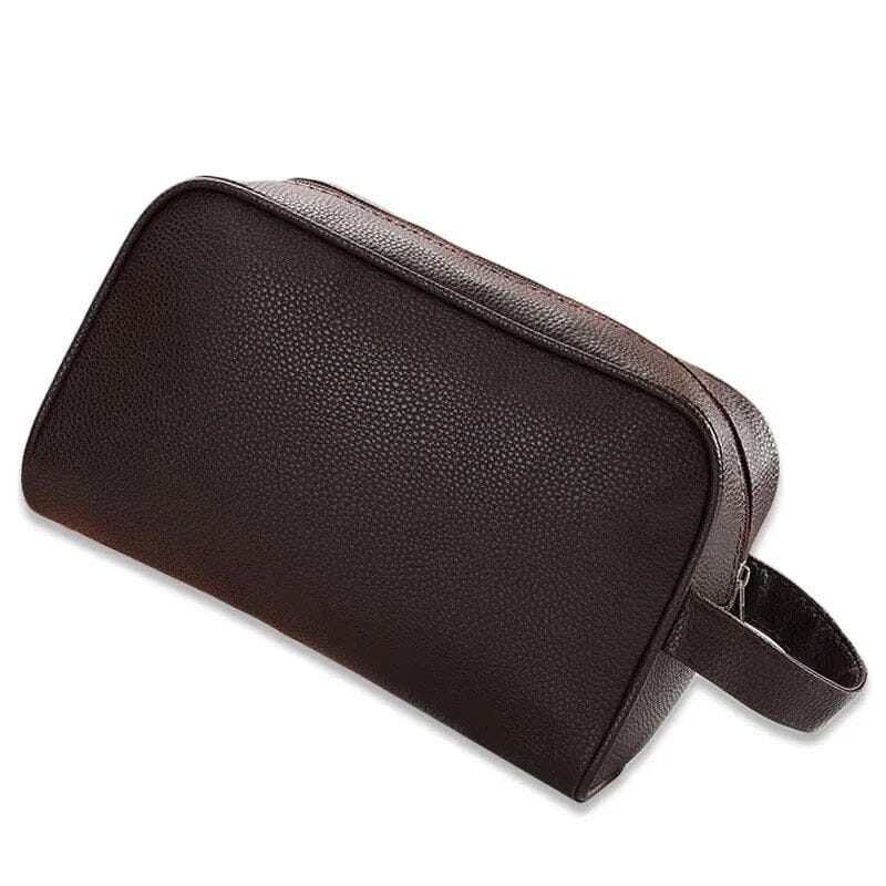 Trousse de toilette homme avec initiales dorées sur fond beige