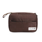 Trousse marron, montrant sa capacité de rangement