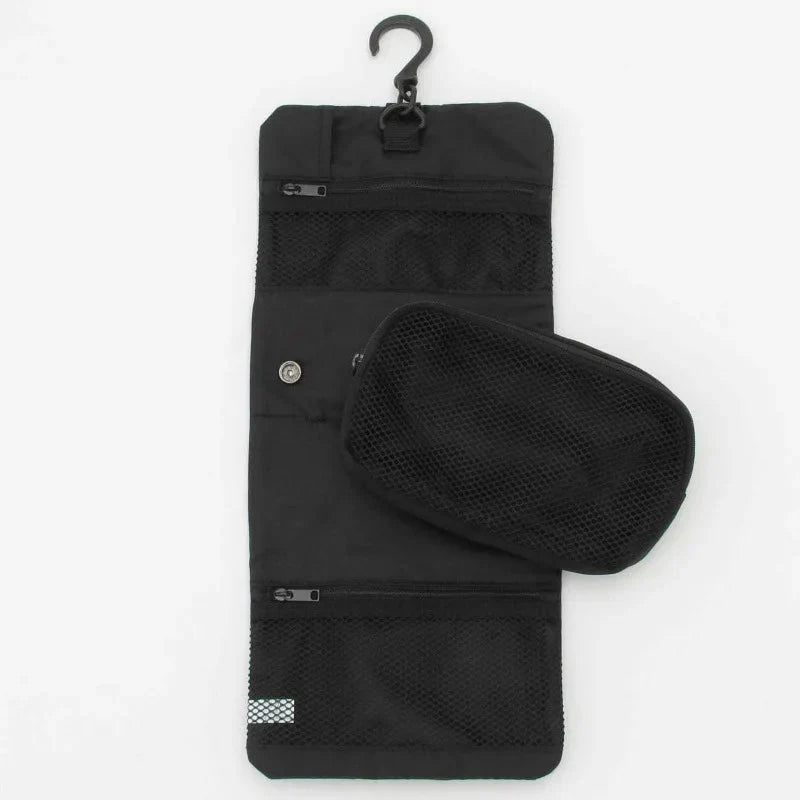 Vue intérieure de la trousse avec compartiments ouverts