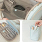 Trousse ouverte montrant l'organisation des articles de toilette