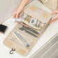 Trousse de toilette fermée, poignée de transport en évidence