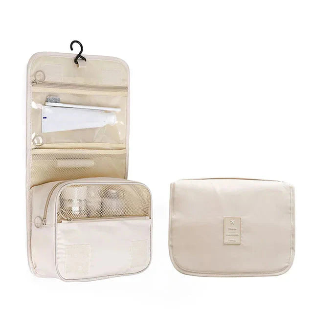 Trousse de toilette beige, compartiments visibles