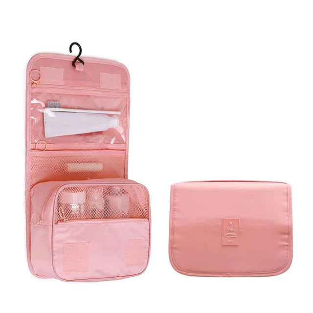 Trousse de toilette rose, compartiments ouverts